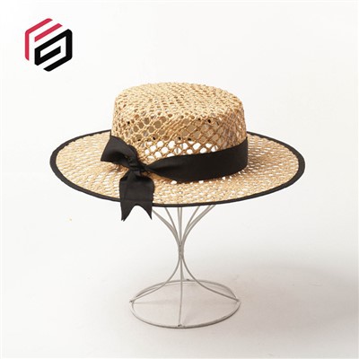 القبعة قبعة من القش للمرأة